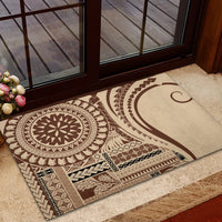 Brown and cream rubber doormat featuring geometric motifs and arch curve
