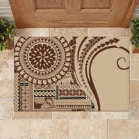 Rectangular brown and cream rubber doormat with large circular design