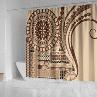Beige shower curtain with brown tribal artwork, including mandala and arch motifs