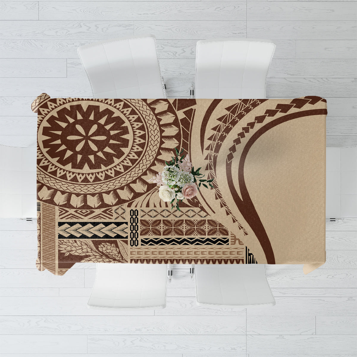 Brown and tan patterned siapo-style tablecloth with bold circular motif, rectangular drape