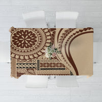 Brown and tan patterned siapo-style tablecloth with bold circular motif, rectangular drape