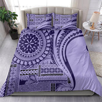 Purple geometric bedding set with large circular motif and matching pillowcases