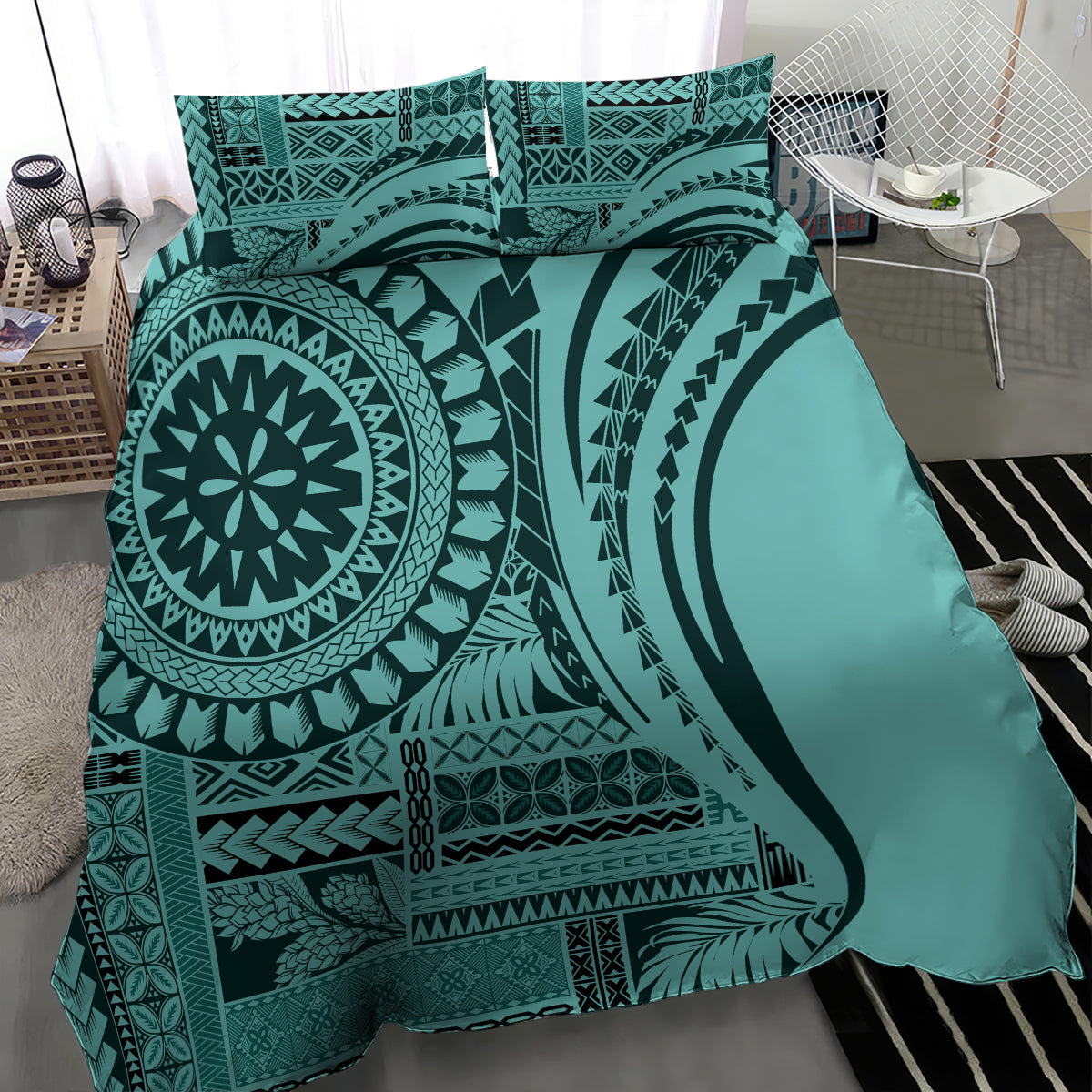 Turquoise duvet cover and shams with large black tribal circle and arch patterns