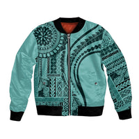 Turquoise bomber jacket with Polynesian siapo print, front zipper, black rib trim