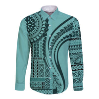 Turquoise long-sleeve button shirt with bold dark tribal print front