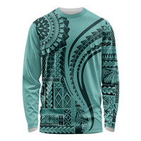 Turquoise long-sleeve shirt with dark geometric tribal print, crew neck