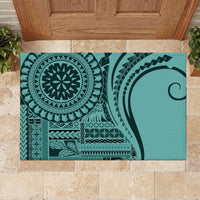 Turquoise patterned rubber doormat with large medallion and geometric blocks
