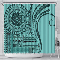 Turquoise shower curtain featuring black mandala, arches, and geometric tribal artwork