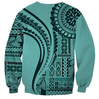 Turquoise unisex sweatshirt with large circular Polynesian motif and geometric side print
