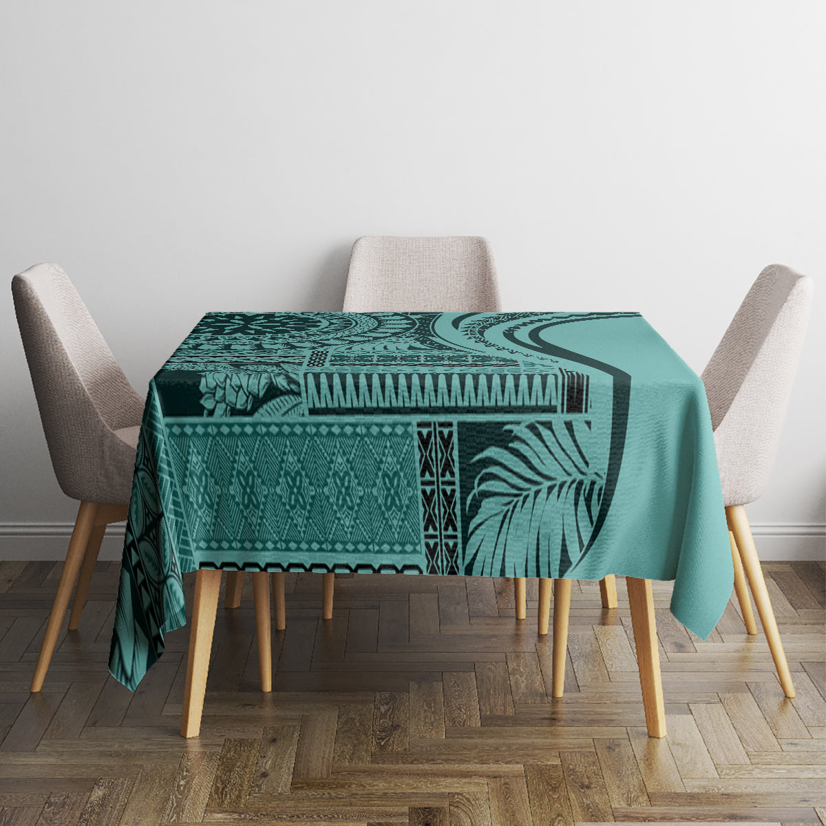 Turquoise patterned tablecloth with leaf stripe motif and geometric border, on dining table