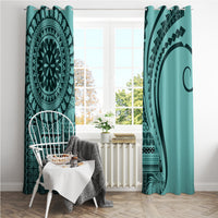 Turquoise window curtain with bold mandala design and dark curved accent on right panel