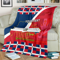 Personalized blanket on light sofa with 'YOUR TEXT' over red and blue flag, 180 Years.