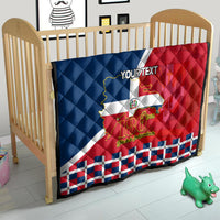 Personalized quilt on a baby crib featuring Dominican flag and 180th years text