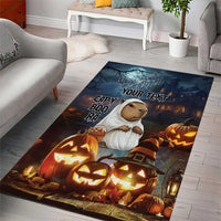 Halloween area rug featuring capybara ghost beside pumpkins and a banner-style “YOUR TEXT”