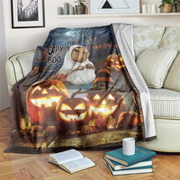 Halloween personalized blanket with capybara in ghost costume beside glowing jack-o-lanterns