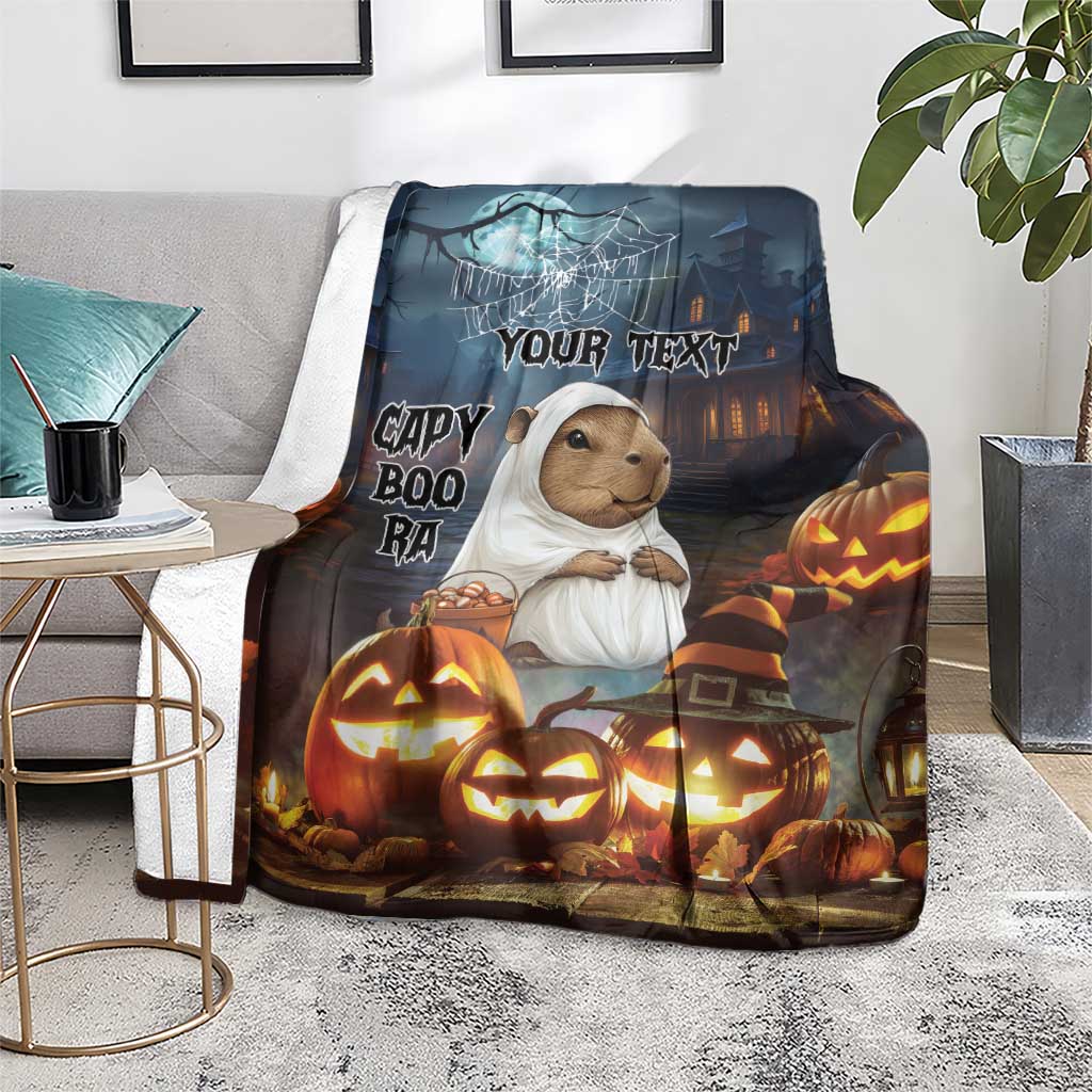 Halloween personalized blanket with capybara ghost character, jack-o-lanterns, and “Your Text”