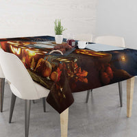 Halloween tablecloth over dining table with warm lantern lights and autumn scene