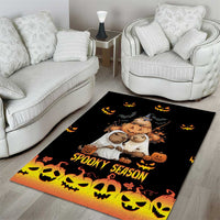 Black Halloween area rug with Spooky Season text, pumpkins, bats, skulls, and cuddly bear faces.