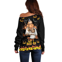 Women’s black off-shoulder sweater, back print “CAPY BOO-RA” with capybaras