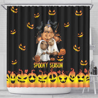 Halloween shower curtain on metal rod, black with jack-o-lantern pattern and 'Spooky Season' art