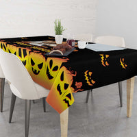 Halloween tablecloth, orange-to-black gradient with smiling pumpkin face pattern