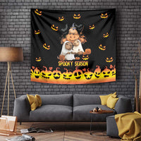 Black Halloween tapestry with 'Spooky Season' title, pumpkin characters, and repeating jack-o-lantern icons