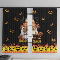 Black Halloween window curtain with jack-o'-lanterns, spooky cartoon animals, and orange trim