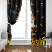 Black Halloween window curtain with spooky cartoon characters, pumpkins, and bright orange bottom