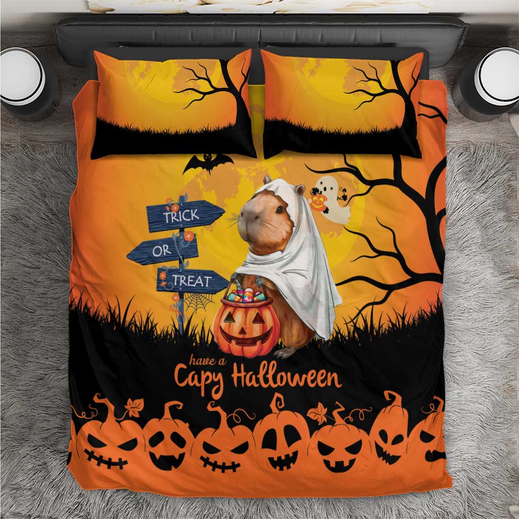 Orange Halloween bedding set with two pillows, bat and pumpkin prints, capybara ghost detail