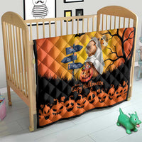 Orange Halloween capybara ghost quilt on a baby crib