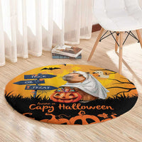 Round orange Halloween rug with capybara ghost, pumpkin center, and 'Have a Capy Halloween' slogan