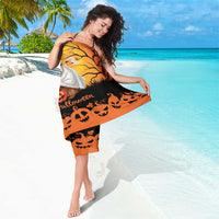 Orange Halloween sarong featuring capybara ghost, black tree branches, and “Happy Halloween”