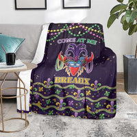 Dark purple Mardi Gras throw blanket with jester mask art, COME AT ME, BREAUX, and bead accents