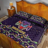 Dark purple quilt bed set with 'BREAUX' crawfish graphic and green-gold fleur-de-lis border