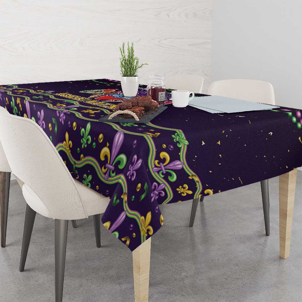 Mardi Gras tablecloth on rectangular dining table with purple and green ornamental print