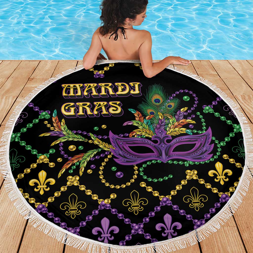 Round black beach blanket with colorful Mardi Gras mask print and fleur-de-lis bead pattern