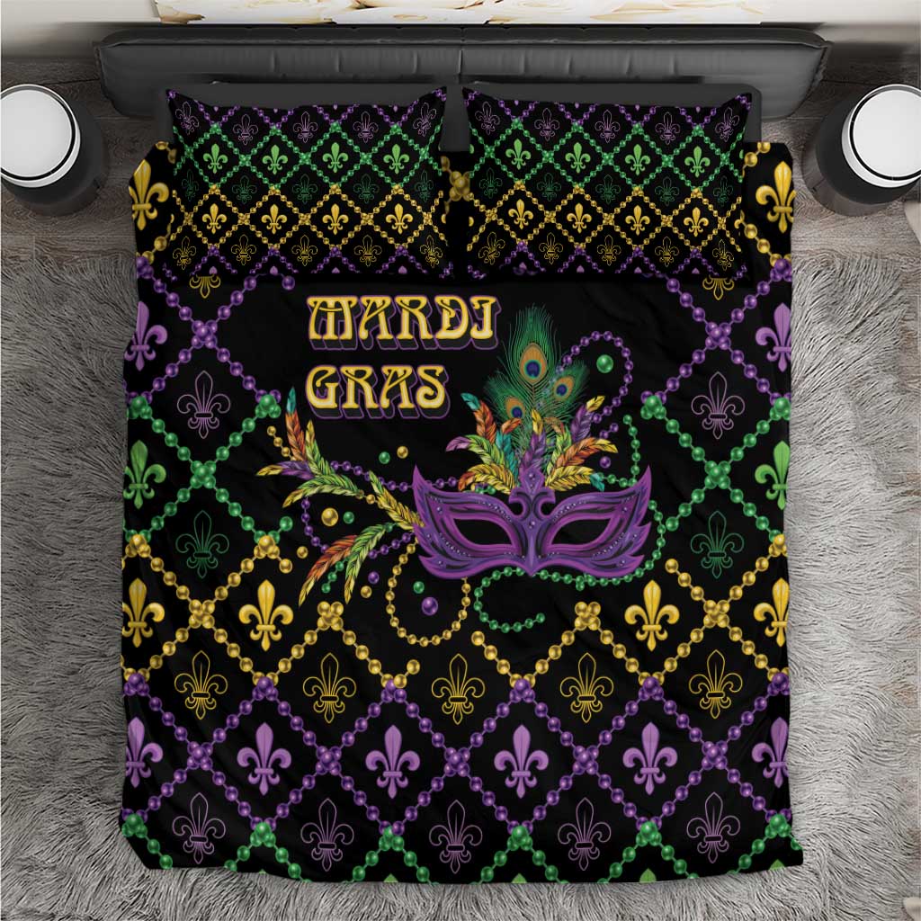 Geometric Mardi Gras bedding set with purple, green, and gold fleur-de-lis pattern and mask
