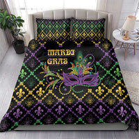 Mardi Gras geometric bedding set featuring fleur-de-lis, beads, and purple mask centerpiece