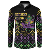 Black button sweatshirt with mardi gras mask graphic and fleur-de-lis geometric pattern.
