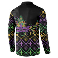 Black button sweatshirt back with peacock mask graphic and fleur-de-lis geometric lattice.