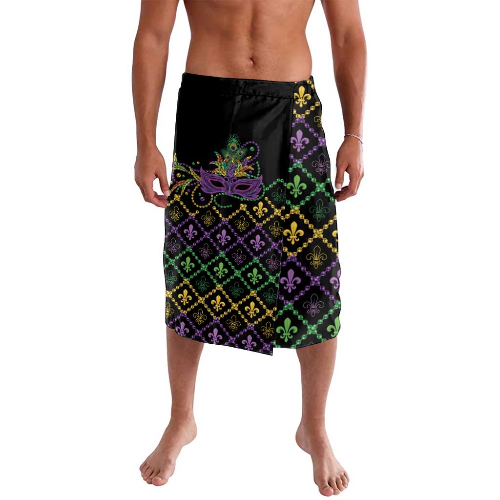 Black geometric fleur-de-lis sarong with purple, green, and gold pattern