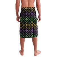 Black geometric sarong with purple, green, and gold quatrefoil pattern