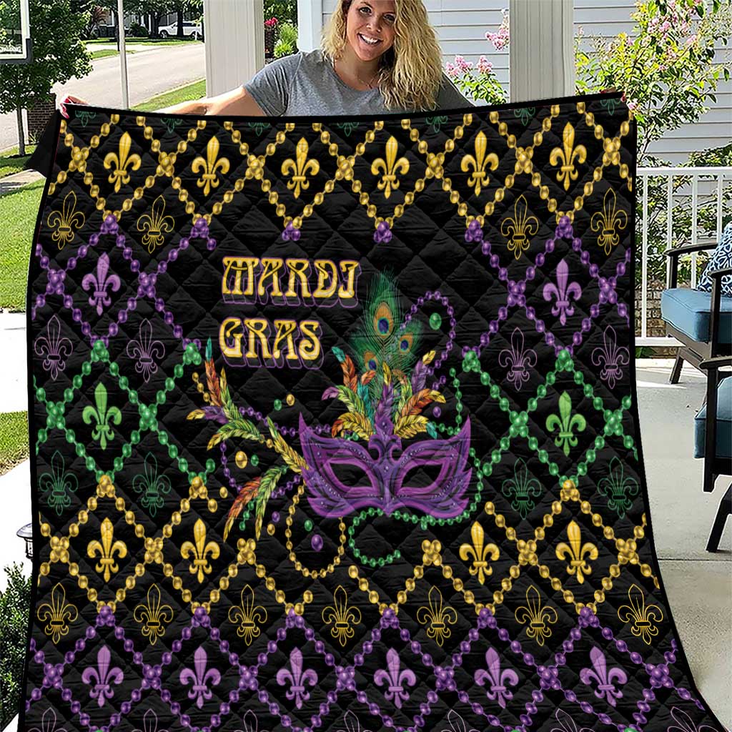 Mardi Gras geometric quilt in black with gold, purple, green fleur-de-lis and mask