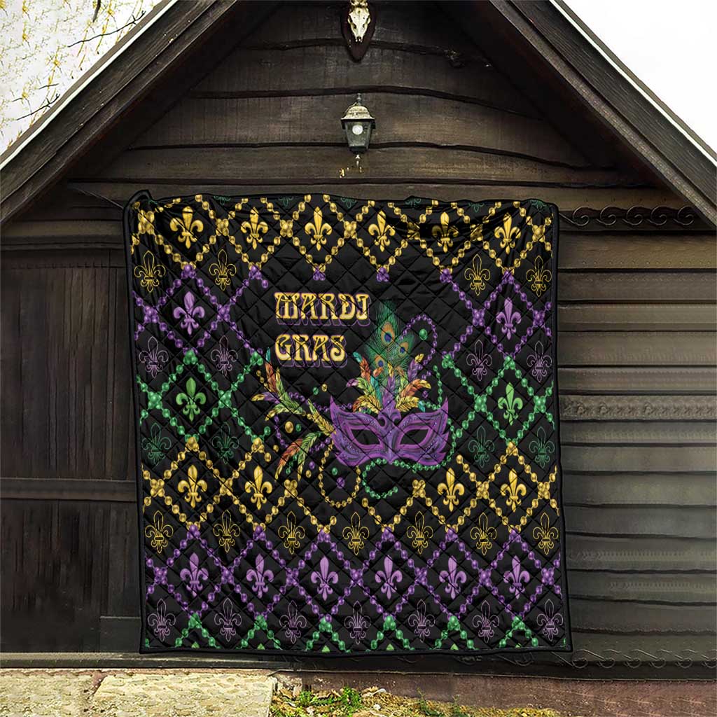 Mardi Gras quilt hanging on wooden wall, black diamonds with gold and purple fleur-de-lis