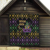 Mardi Gras quilt hanging on wooden wall, black diamonds with gold and purple fleur-de-lis