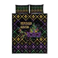 Black quilt bed set with matching pillows; purple, green, and gold fleur-de-lis mask motif