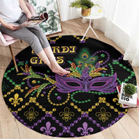 Black round Mardi Gras carpet with purple masquerade mask and colorful fleur-de-lis design