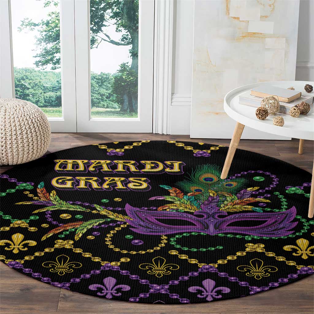Black round Mardi Gras carpet with purple mask center and gold-and-green fleur-de-lis border
