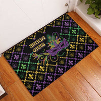 Mardi Gras rubber doormat in corner layout, purple mask and fleur-de-lis lattice design