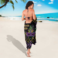 Black Mardi Gras sarong skirt with geometric fleur-de-lis and purple mask on back